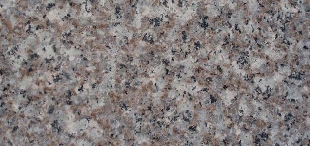 Bainbrook brown granite is a brown medium variation granite with hints of cream,gray and black flecks.