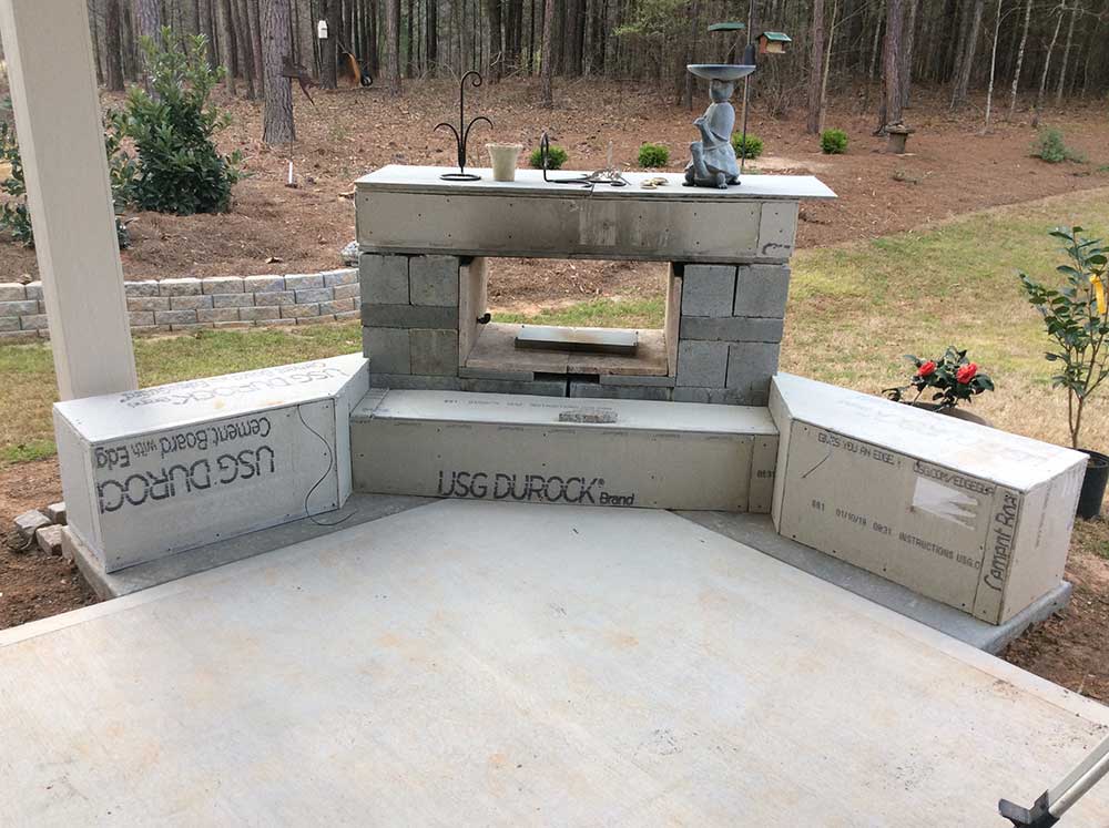 Before photo of Caramalo granite installed in BBQ area.