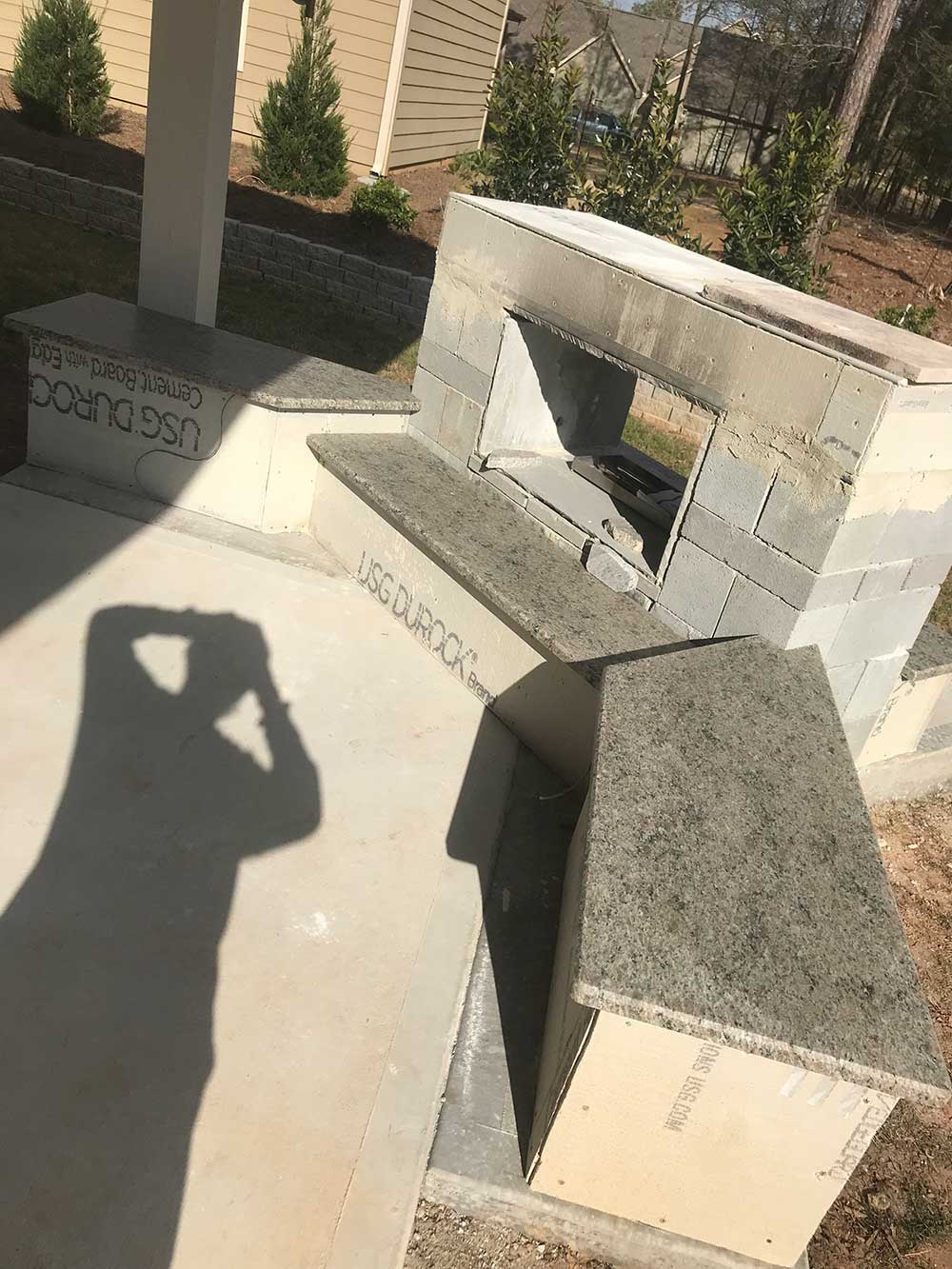 Photo of Caramalo granite installed in BBQ area.