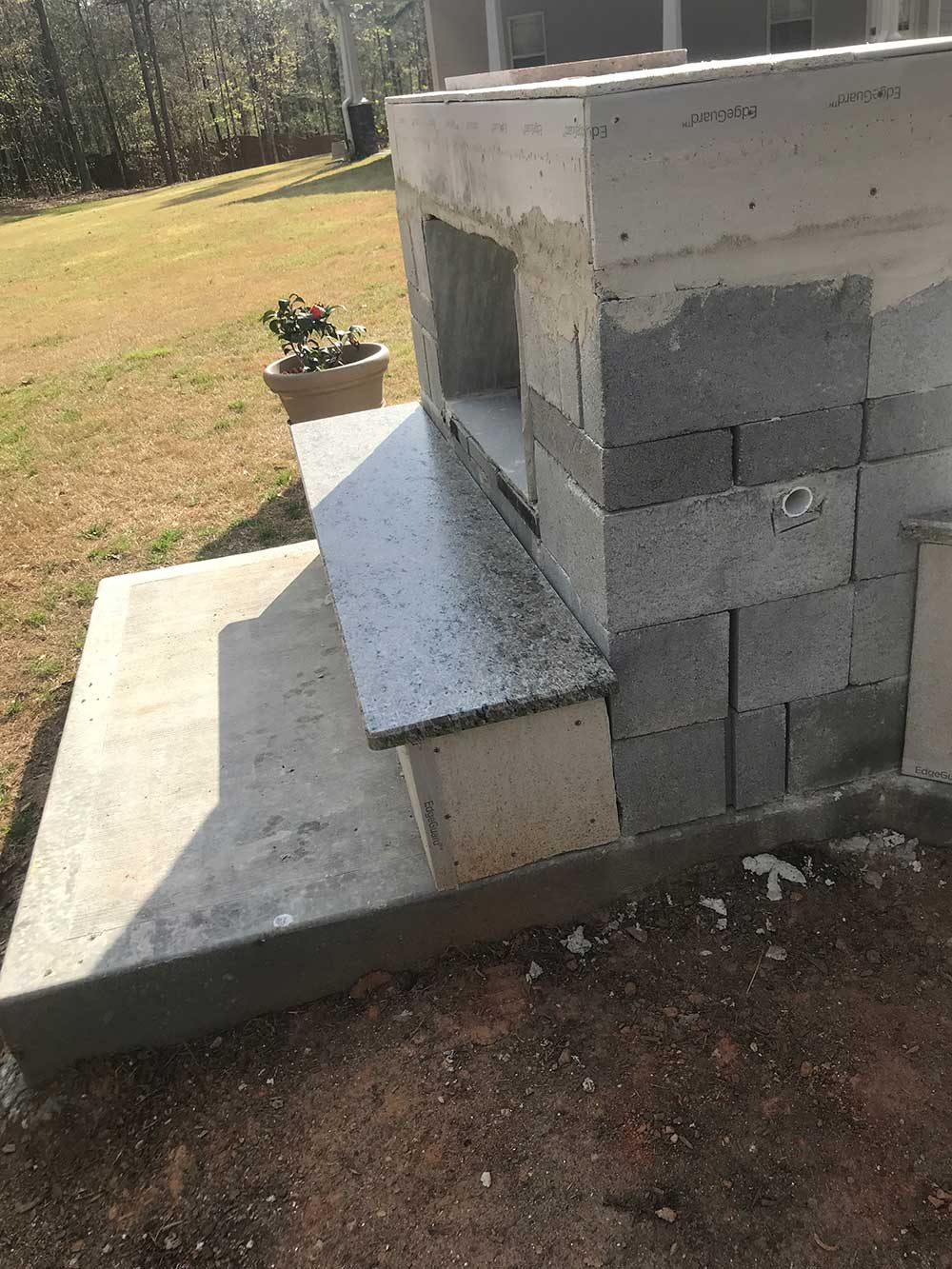 Photo of Caramalo granite installed in BBQ area.