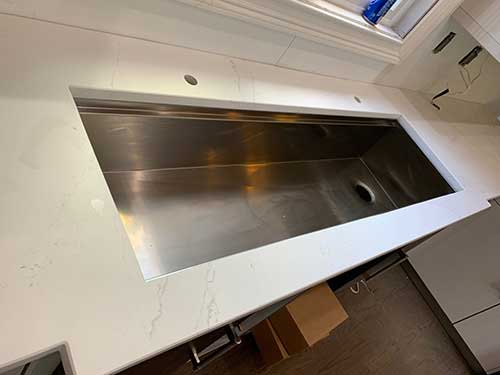Photo from a Project Profile: Eternal Calacatta granite installation.